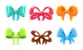 Cute glossy bows of different colors, user interface assets for mobile apps or video games vector Illustration on a Royalty Free Stock Photo