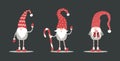 Cute gnomes in red santa hats on black background. Scandinavian christmas elves. Royalty Free Stock Photo