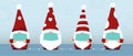 Cute Gnomes or Santa with red hats, wearing medical masks to prevent disease, flu, air pollution. Concept of social distancing.