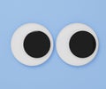 Cute googly eyes funny Isolated on blue pastel background , crazy kawaii eyes minimal idea creative concept & business