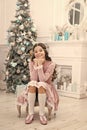 Cute and gorgeous. Happy Christmas girl. Little girl with xmas look. Small girl at Christmas tree. Baby girl smile in