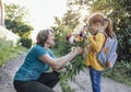 Cute granddaughter hugging her happy grandmother Royalty Free Stock Photo