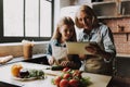 Cute Grandma and Granddaughter Cutting Vegetables