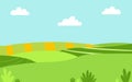 Cute green meadow, blue sky with white fluffy clouds Royalty Free Stock Photo