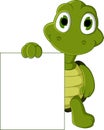 Cute green turtle cartoon holding blank sign