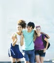 Cute group of teenages at the building of university with books huggings, back to school Royalty Free Stock Photo