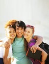 Cute group of teenages at the building of university with books huggings, back to school Royalty Free Stock Photo