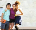 Cute group of teenages at the building of university with books huggings, back to school Royalty Free Stock Photo