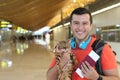 Cute guy travelling with his best friend Royalty Free Stock Photo