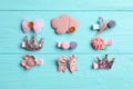 Cute hair clips on blue wooden table, flat lay Royalty Free Stock Photo