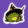 Cute Halloween frog sticker. Spooky green toad with witch hat, magic wand. Adorable mysterious animal wizard, fall party