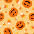 Cute Halloween pattern. Vector seamless background with pumpkins and candies Royalty Free Stock Photo