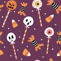 Cute abstract halloween seamless vector pattern background illustration with seasonal candies and lollipops collection