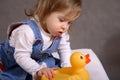 Cute handicapped girl with toy Royalty Free Stock Photo