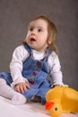 Cute handicapped girl with toy Royalty Free Stock Photo