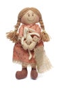 Cute handmade doll with easter bunny in her hand on white background Royalty Free Stock Photo
