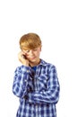 Cute handsome young boy speaking with a mobile phone Royalty Free Stock Photo