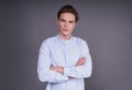 Portrait of a nice, calm young man in a blue shirt Royalty Free Stock Photo