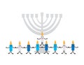 Cute Hanukkah candles with smiling face standing in front of Hanukkah menorah