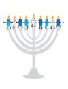 Cute Hanukkah candles with smiling face sitting on Hanukkah menorah