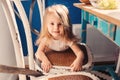 Cute happy baby girl having fun on the kitchen Royalty Free Stock Photo