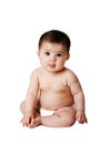 Cute happy baby infant sitting, isolated. Royalty Free Stock Photo