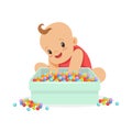 Cute happy baby sitting and playing with box full of multicolored small balls, cartoon character vector Illustration Royalty Free Stock Photo