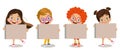 cute and happy children holding placart your text here note paper Royalty Free Stock Photo