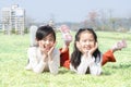 Cute happy children laying on grass Royalty Free Stock Photo