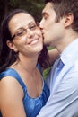 Cute happy couple in a kiss intimate moment Royalty Free Stock Photo