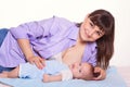 Cute happy family mother mum breastfeeding baby boy girl on whit Royalty Free Stock Photo