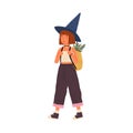 Cute happy girl wearing witch hat carry backpack full of magical herbs. Funny portrait of joyful little wizard with