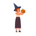 Cute happy girl wearing witch hat hold Halloween pumpkin. Funny portrait of joyful wizard showing jack o lantern. Flat Royalty Free Stock Photo