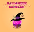 Cute happy halloween cupcake with rose cream, witch hat