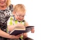 Cute happy kid reading a book Royalty Free Stock Photo