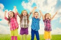 Cute happy kids are jumping together Royalty Free Stock Photo