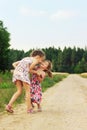 Cute happy kids playing in summer filed