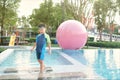 Cute happy little Asian toddler boy in swimming suit wear swimming goggles smile and looking at camera, Happy kid enjoy playing at Royalty Free Stock Photo