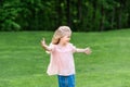 cute happy little child with open arms looking away Royalty Free Stock Photo