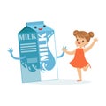 Cute happy little girl and funny milk carton box with smiling human face playing and having fun, healthy childrens food Royalty Free Stock Photo