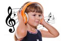 cute happy little girl listening music with headphones Royalty Free Stock Photo