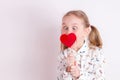 Funny girl eating lollipop Royalty Free Stock Photo