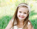 Cute happy little girl on the meadow Royalty Free Stock Photo