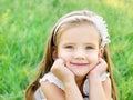 Cute happy little girl on the meadow Royalty Free Stock Photo