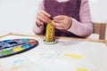 Little girl, preschooler, painting with water color, selective focus Royalty Free Stock Photo