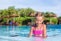 Cute happy little girl in the swimming pool Royalty Free Stock Photo