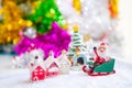 Cute happy Santa Claus dolls and Christmas props decorations on