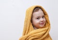 Cute happy smiling Baby Girl in soft Hooded Towel after Bath Royalty Free Stock Photo