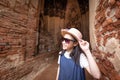 Cute happy smiling tourist girl at Wat Chaiwatthanaram is a Buddhist temple