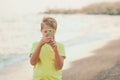 Cute happy smiling white kid using modern smart phone Royalty Free Stock Photo